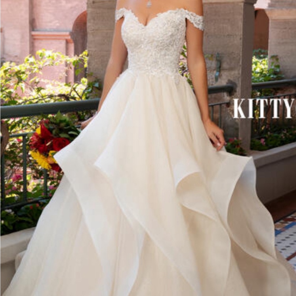 Kitty Chen, size 18, Leandre style H2054.  From Poffie Girls in Charlotte.